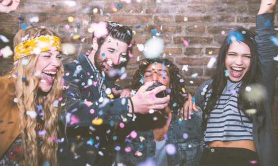 Group of young adults having fun at a party